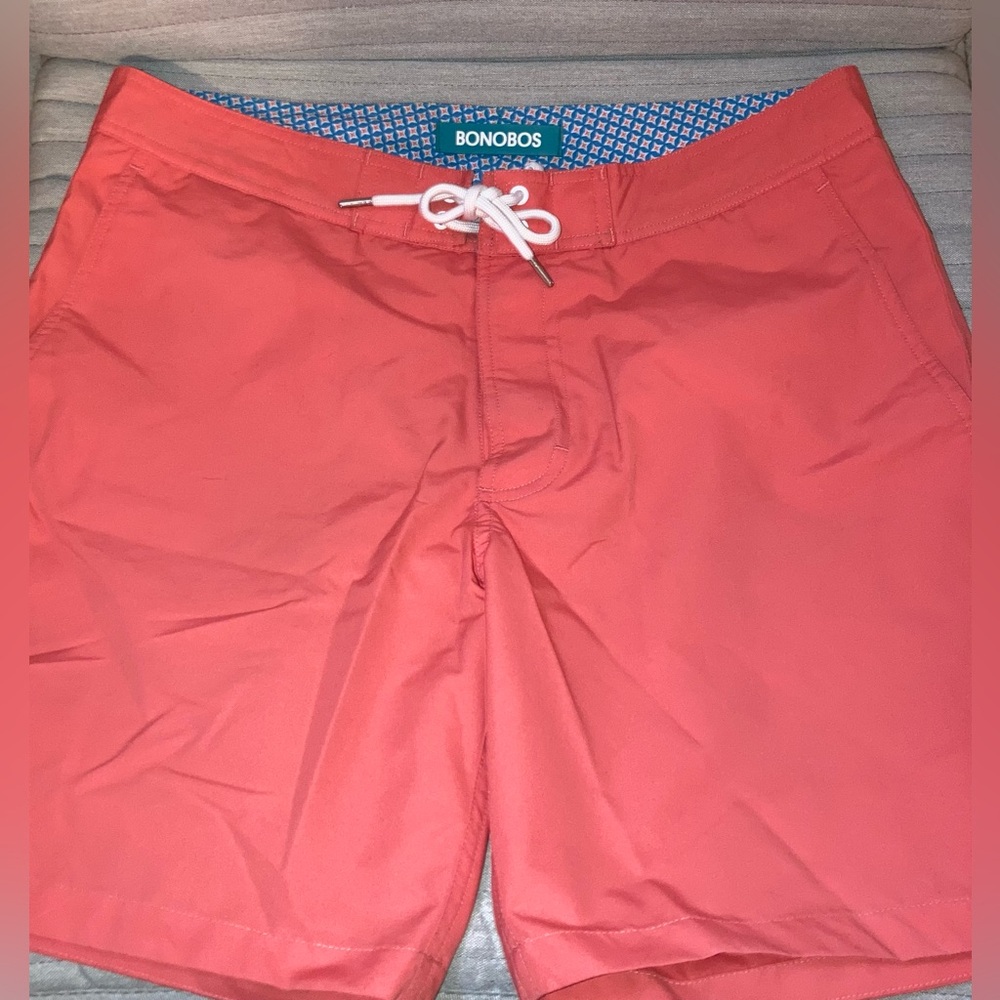 Bonobos Swim Shorts. Color is coral/salmon. Size 31 with 7” inseam.